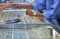 Giá vàng hôm nay 27-7: Bị “đánh xuống”dưới 1.800 USD/ounce