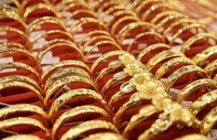 Giá vàng hôm nay 13-2: Biến động mạnh, dự báo tăng tiếp