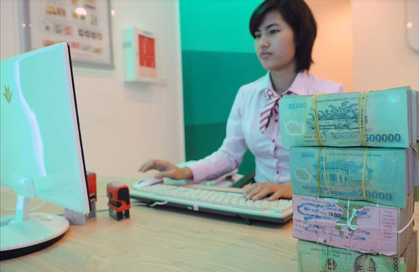 Ngân hàng Nhà nước tăng bơm tiền sau nới room tín dụng