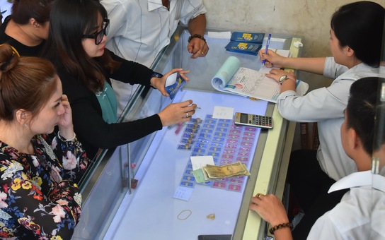 Giá vàng hôm nay 26-9: USD tăng giá trở lại, vàng đi xuống